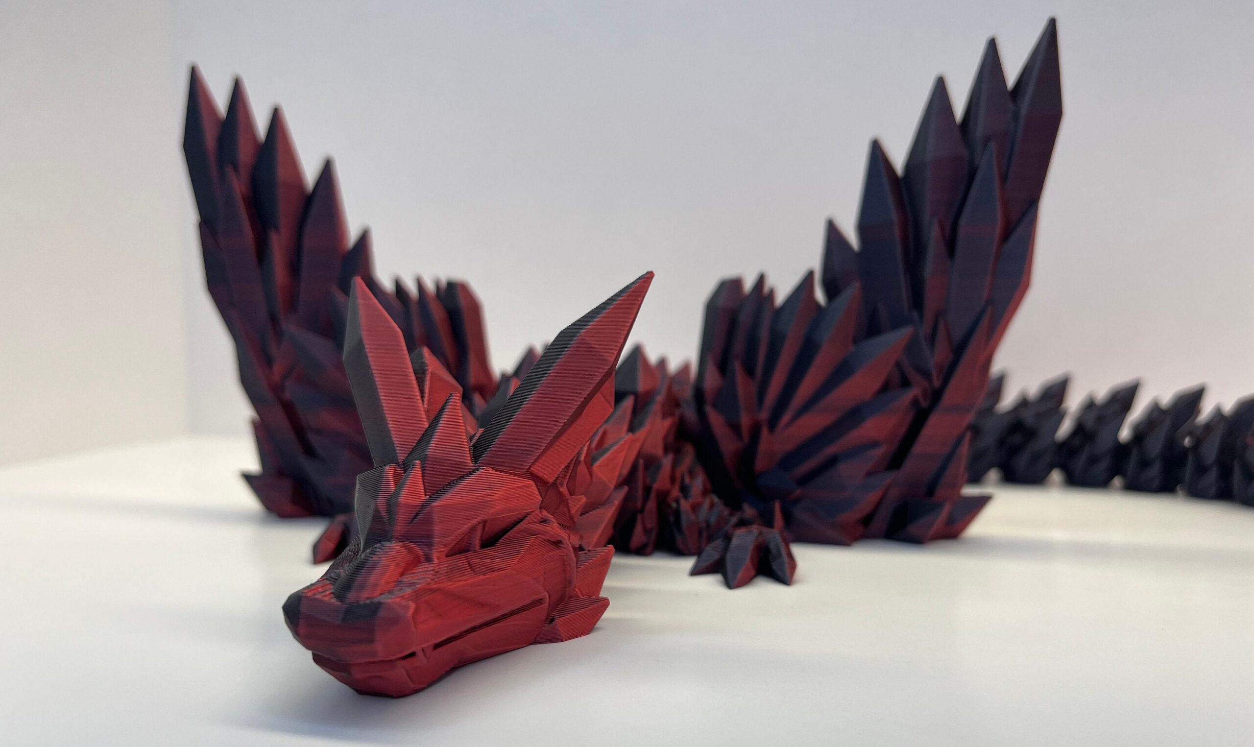 red 3d-printed dragon red 3d-printed dragon